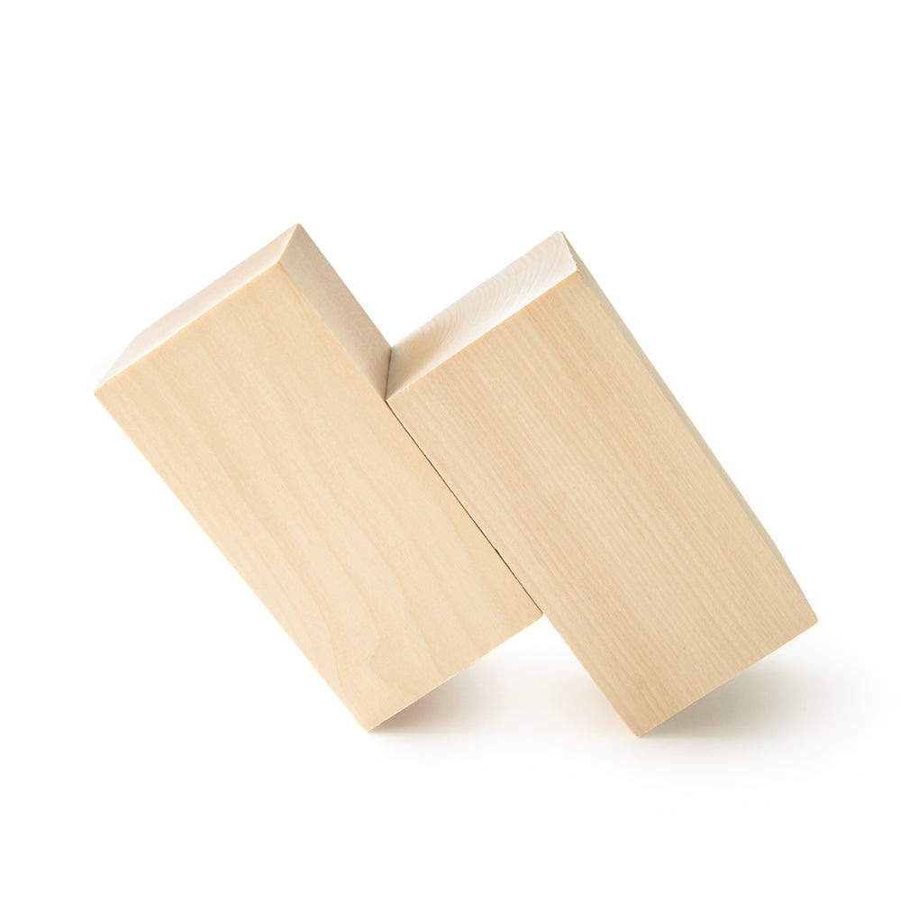 Two unfinished maple milestone blocks showing natural wood grain and sanded finish